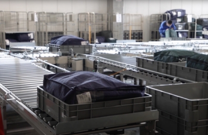 コンベアと連動した自動仕分けシステム